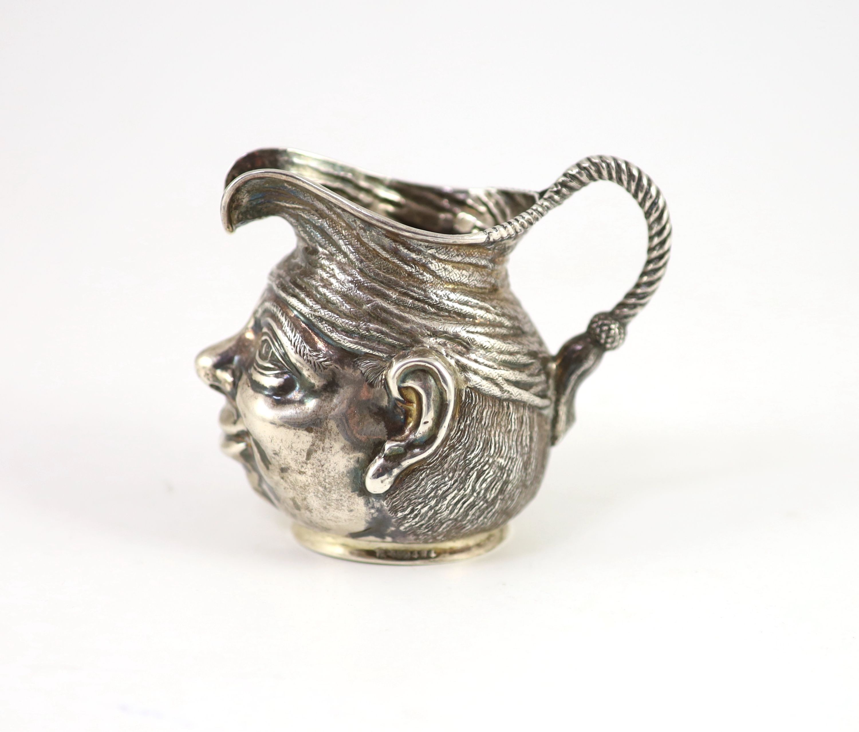 An Edwardian novelty silver cream jug, modelled as a gentleman's head with turban?, Williams, Birmingham, Ltd